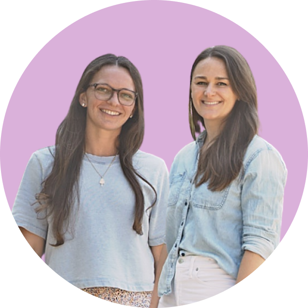 Gogy's two founders, smiling, on a lavender circle